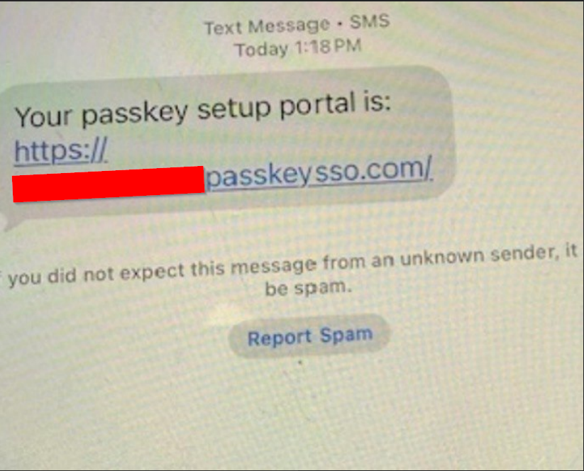 Smishing lure pointing to passkey-themed host under passkeysso[.]com